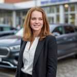 Who is Abigail Kampmann and her influence in the American auto dealership business